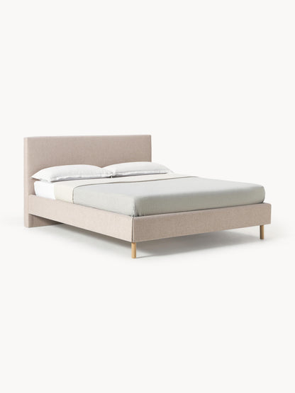 Giulastri Upholstered Bed with Wooden Feet