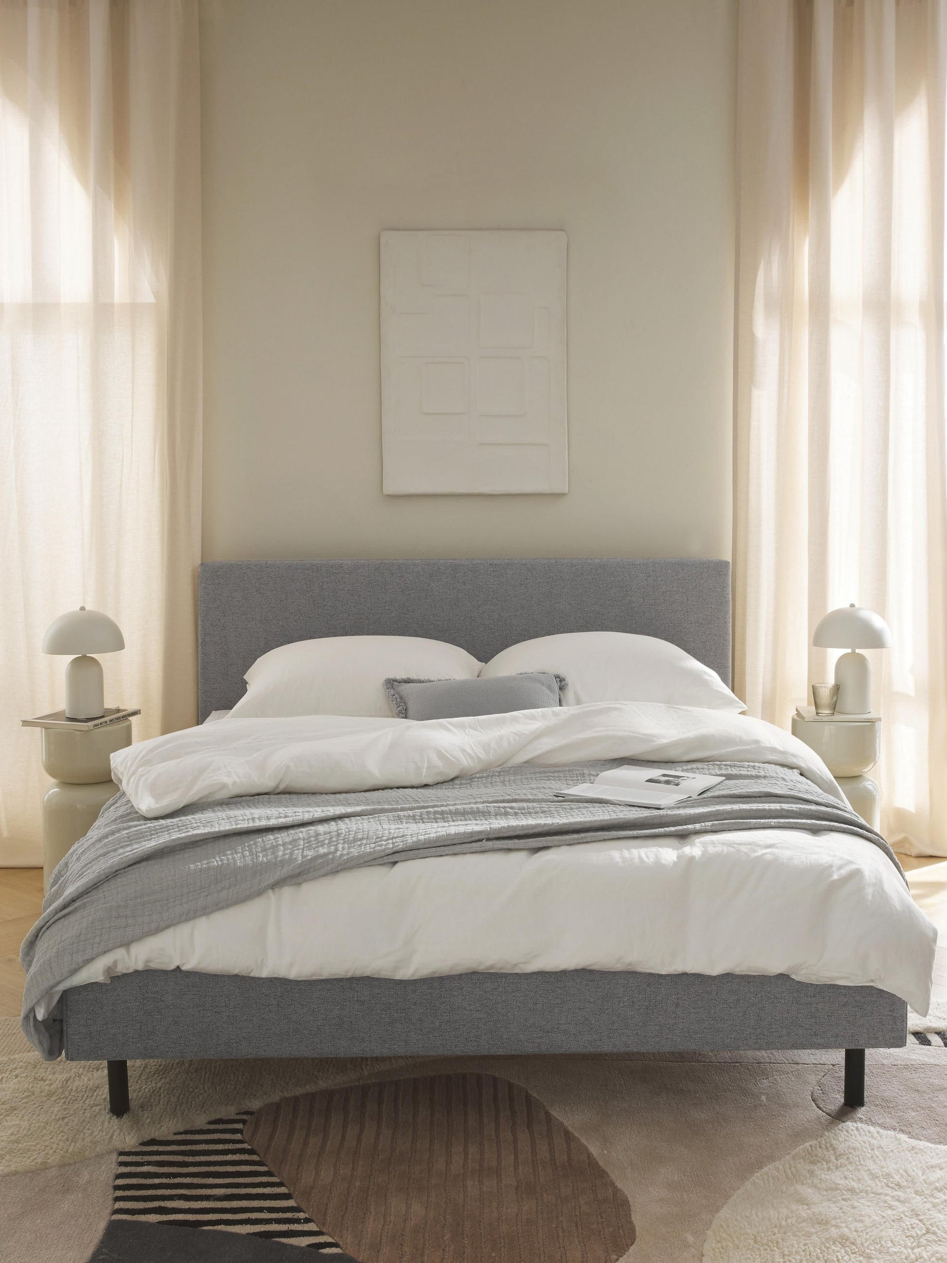 Giulastri Upholstered Bed with Wooden Feet