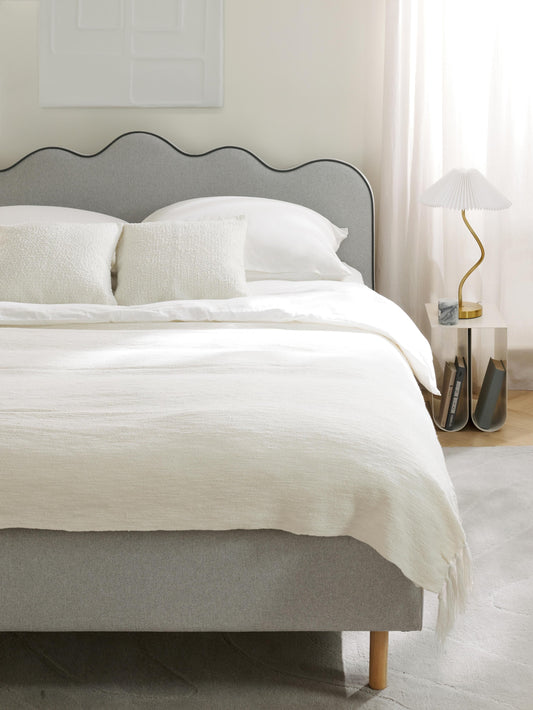 Romveil Upholstered Bed with Wavy Headboard
